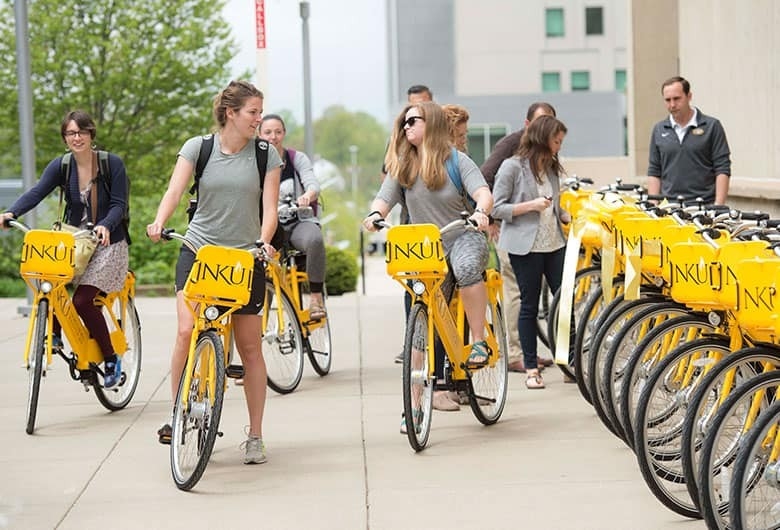 Students riding bikes