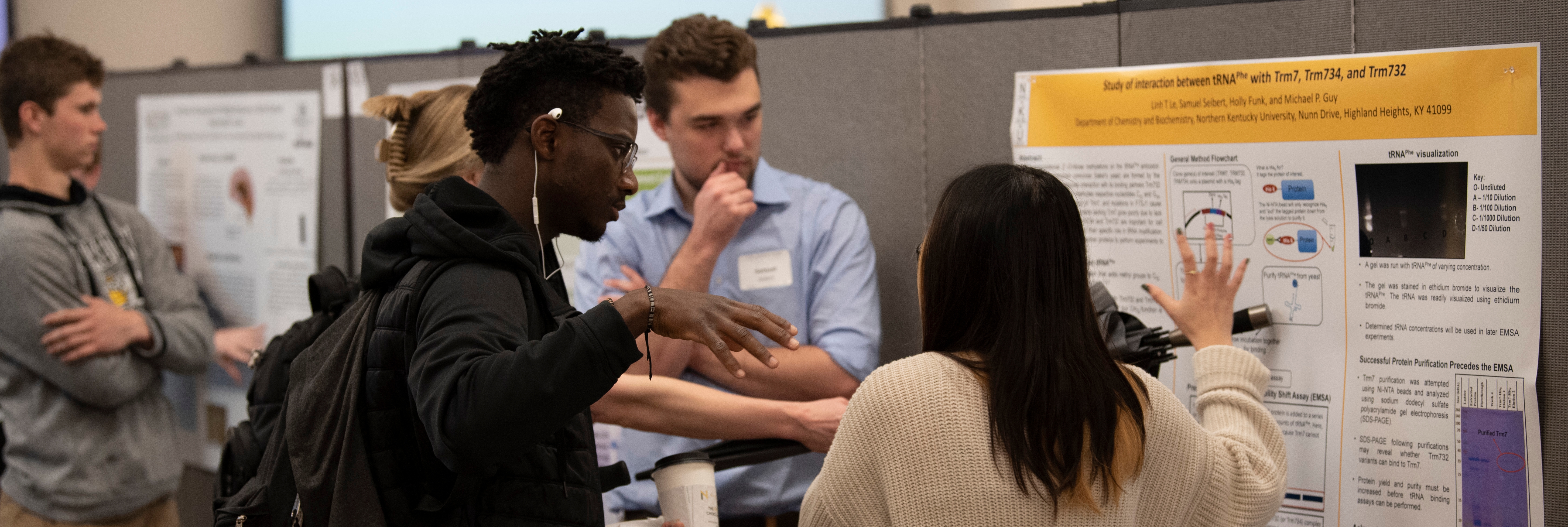 Students presenting research to fellow students